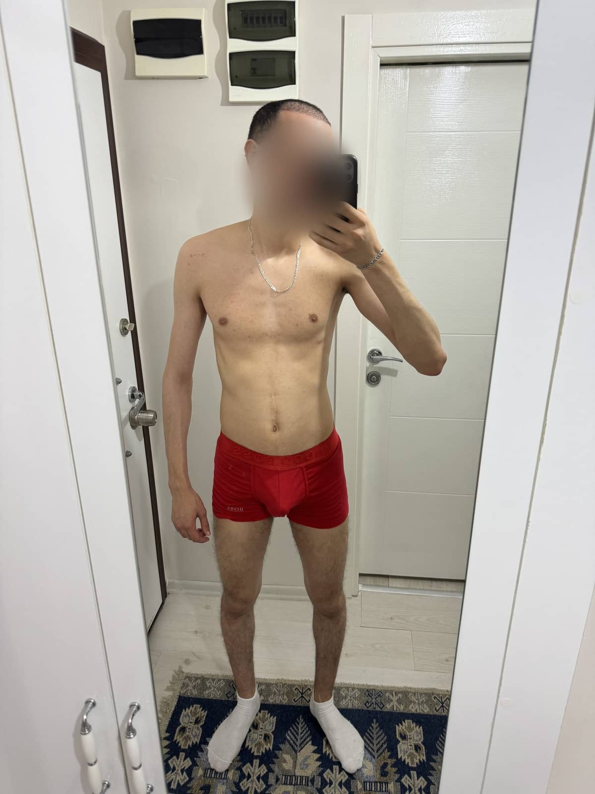 Mehdi around day 15, full body mirror photo, slightly fuller chest and arms