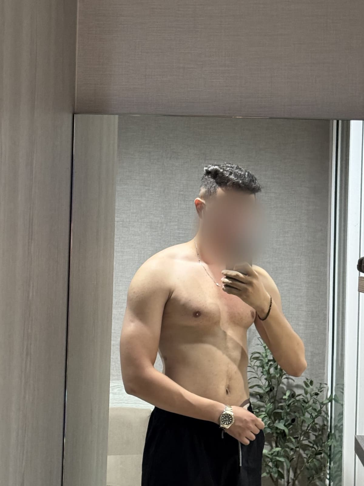 Today at 92 kg, shirtless mirror photo, defined chest and arms